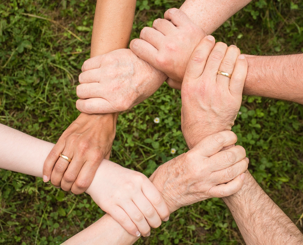 holding hands building support circle